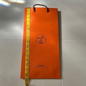 Hermes gift bag with ribbon